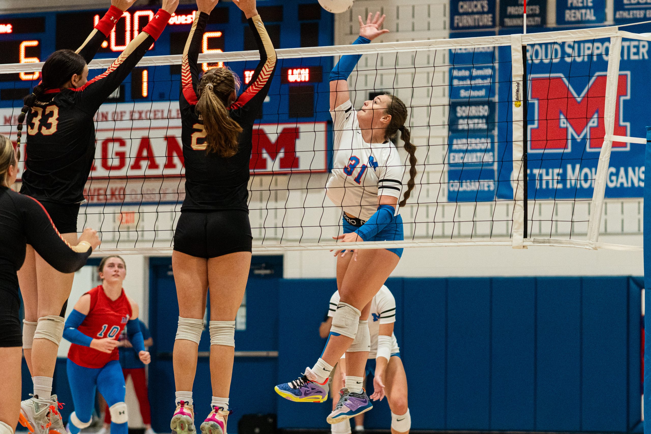 MHS volleyball sweep round one over rival UHS to remain undefeated